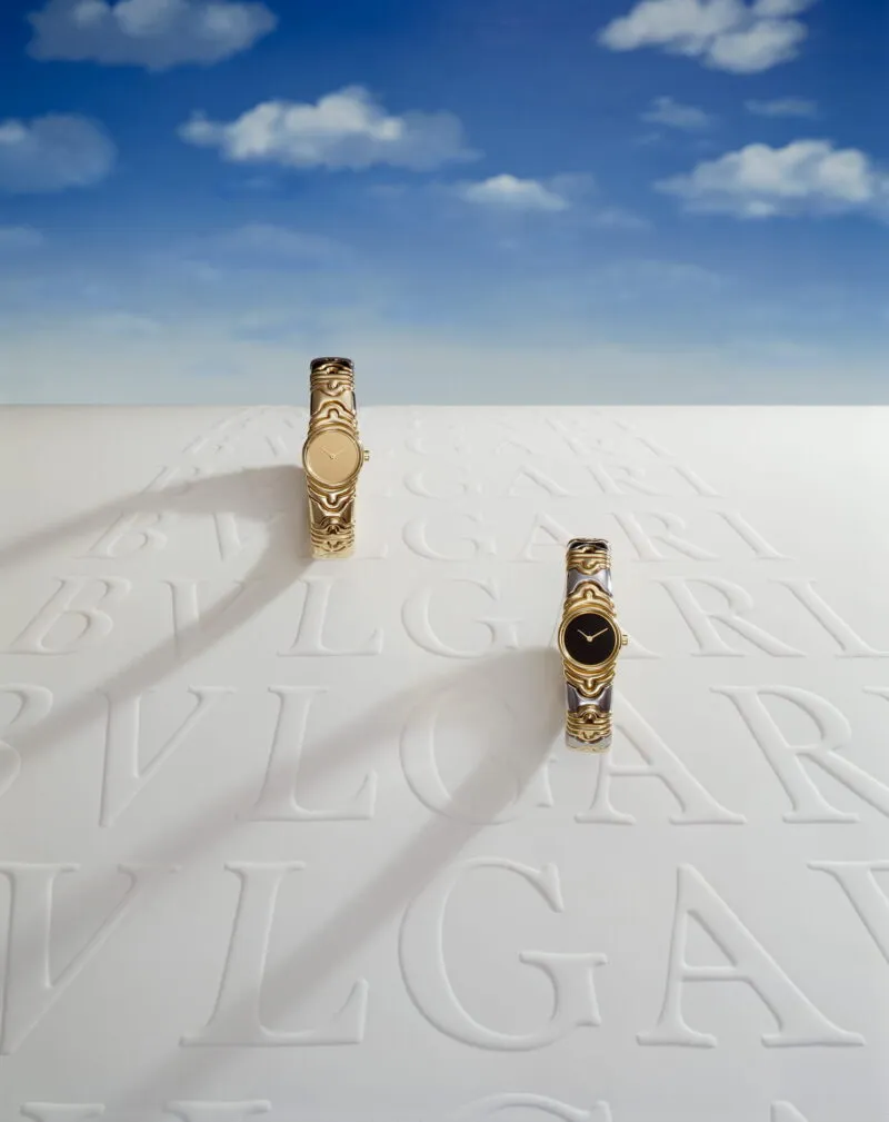 BVLGARI Heritage - Parentesi gold watches on BVLGARI embossed surface