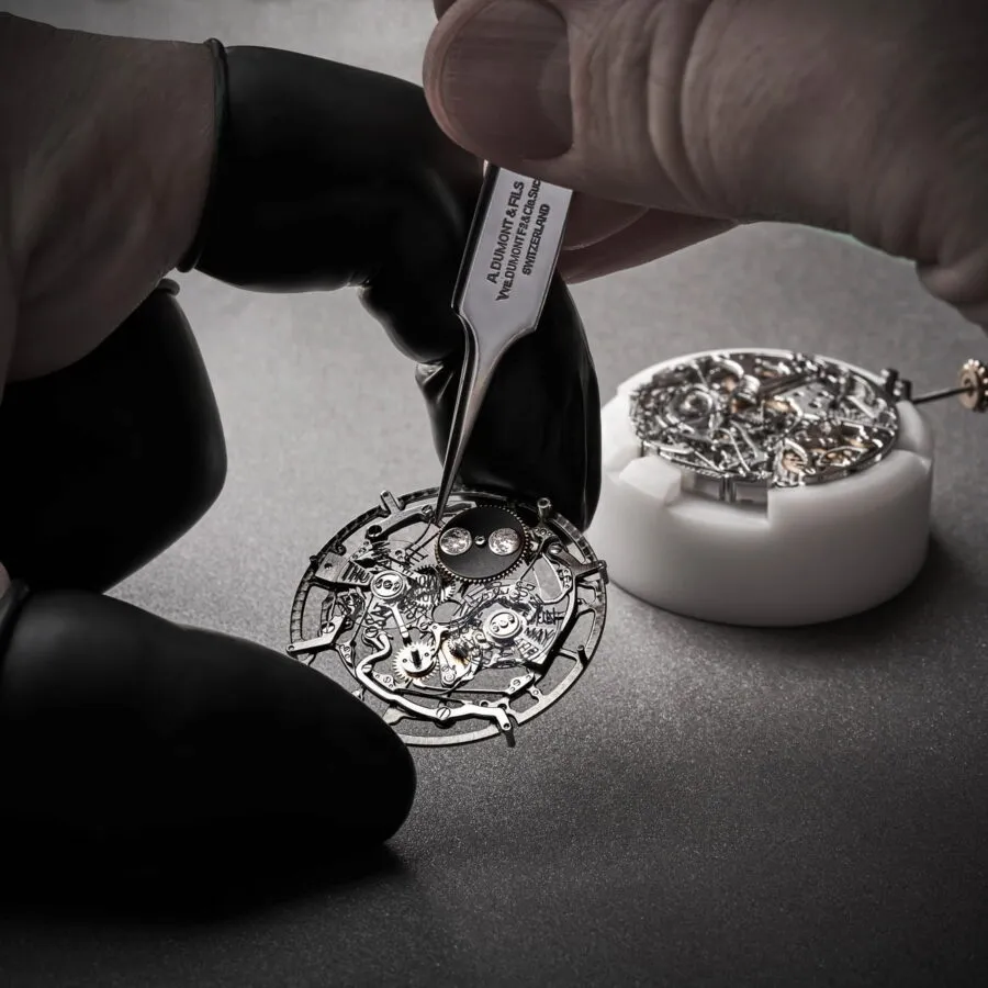BVLGARI Grandes Complications - watchmaker assembling movement with tweezers